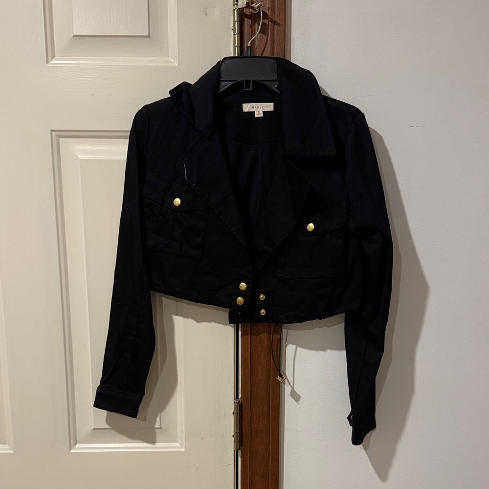 Elegant Black Utility Jacket with Gold Accents